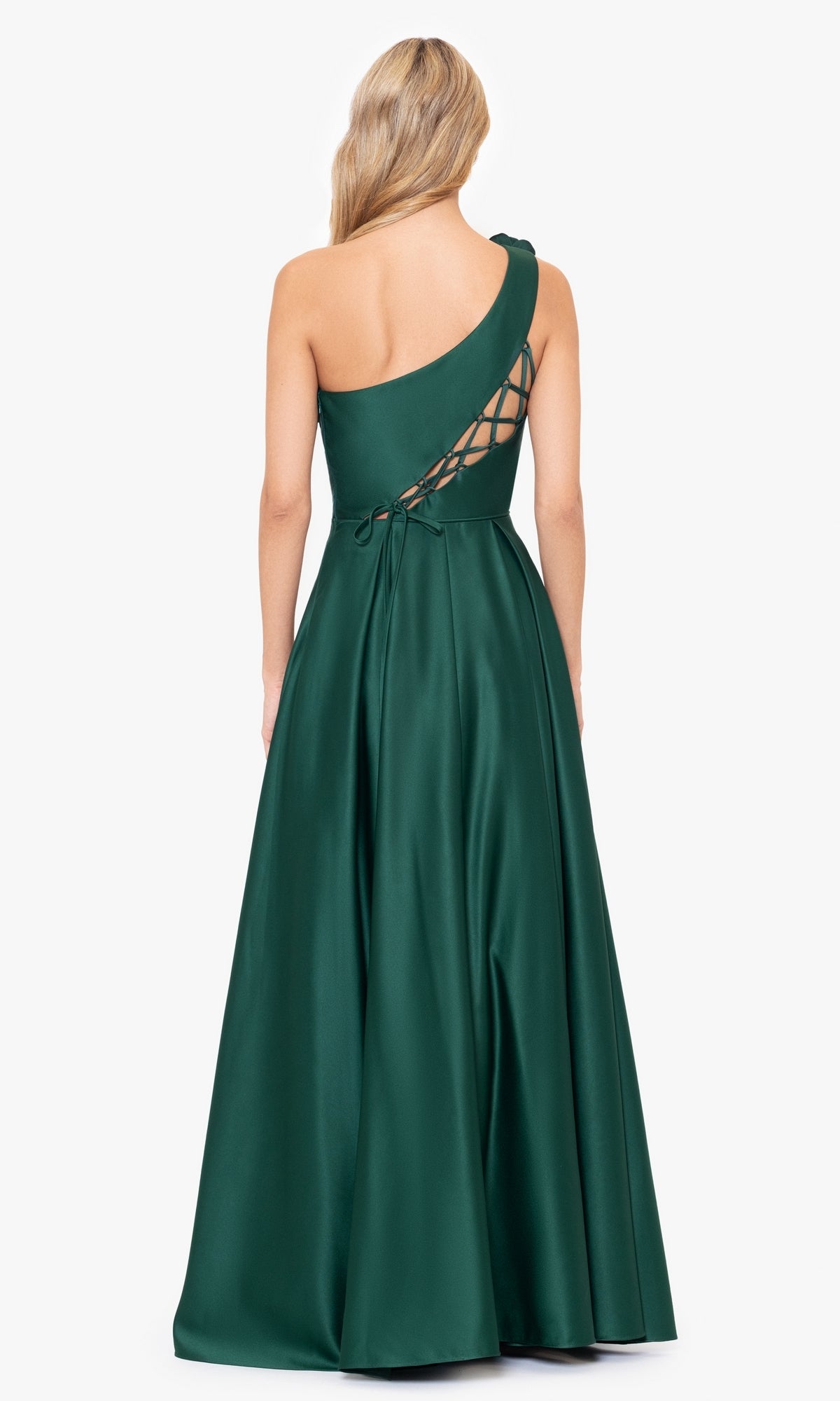 A woman models the Hunter Green One-Shoulder Long Prom Dress 4600BN, featuring a crisscross lace-up back, floor-length satin fabric, and an elegant A-line silhouette, standing against a plain background.